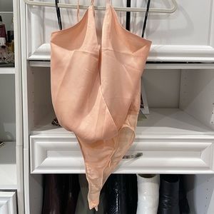 Three different tops. Worn once or not at all